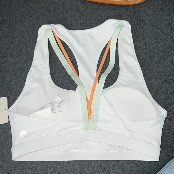 White fabletics sports bra with multicolor straps - Picture 6 of 11